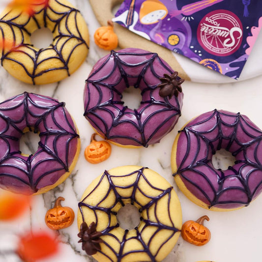 Suncore Foods Halloween Baked Donuts with Purple Carrot Cream Cheese Glaze